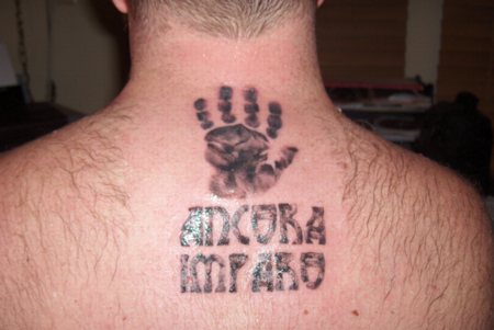 Daddy TattoosHis Kid's Handprint On His Back